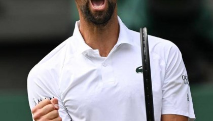 涉险闯进温网八强 德约希望拥有费德勒的“网球魔法”